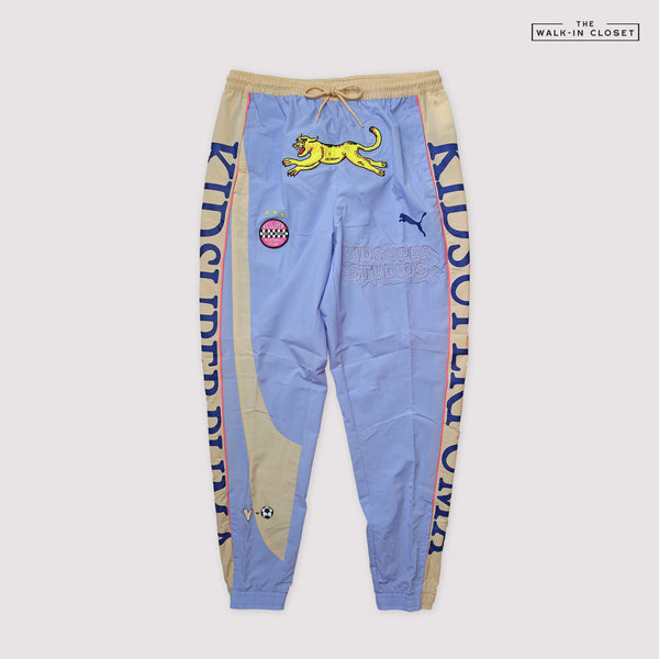 PUMA X KIDSUPER STUDIOS TRACK PANTS "BRUNNERA BLUE" - 598462-38